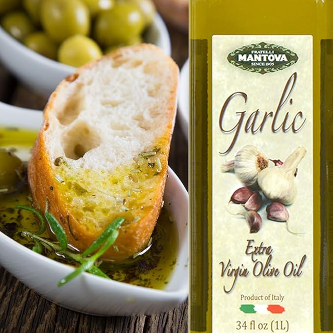 Mantova Garlic Extra Virgin Olive Oil (EVOO), Cold-Pressed and Imported from Italy 34 oz Glass Bottle - Flavorful Topping for Salads, Vegetables, and Pasta Dishes - Ideal for Dipping Italian Bread or Pan Frying - Convenient and Versatile (Pack of 2)