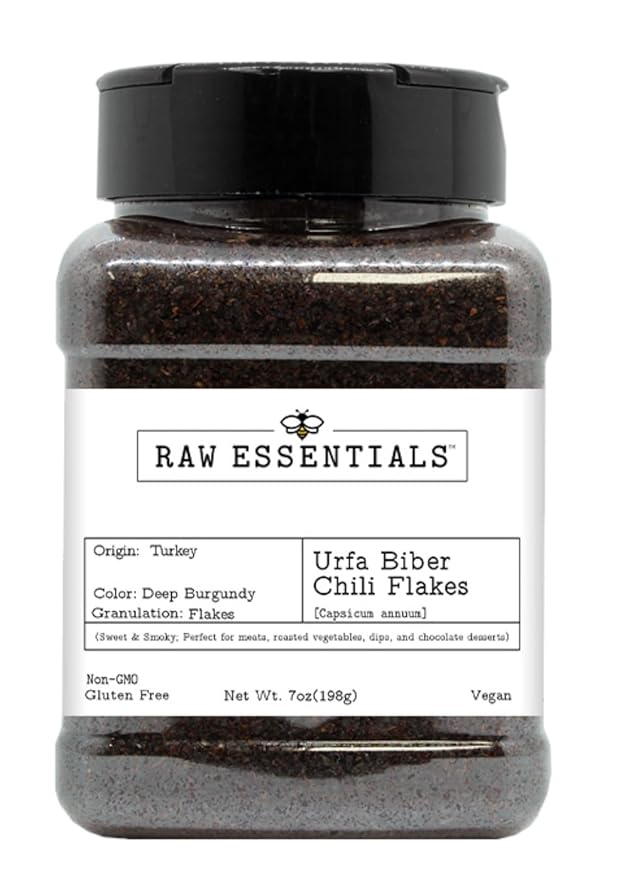 Raw Essentials Urfa Biber Chili Flakes ??Sweet & Smoky ??Used to flavor Meats, Roasted Vegetables, Dips, and Chocolate ??Non-GMO, Gluten Free, & Vegan - 7 Ounce Bottle