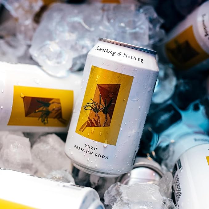 Something & Nothing Yuzu Flavoured Sparkling Water | Lightly Carbonated, Full Flavoured with Added Grape & Lemon Juice | Vegan & Low Calorie Soda | 12 Fl Oz Cans (Pack of 12)